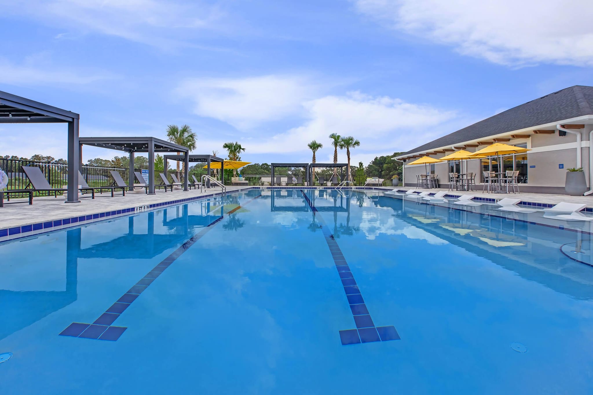 Large commercial resort-style swimming pool by Grunit