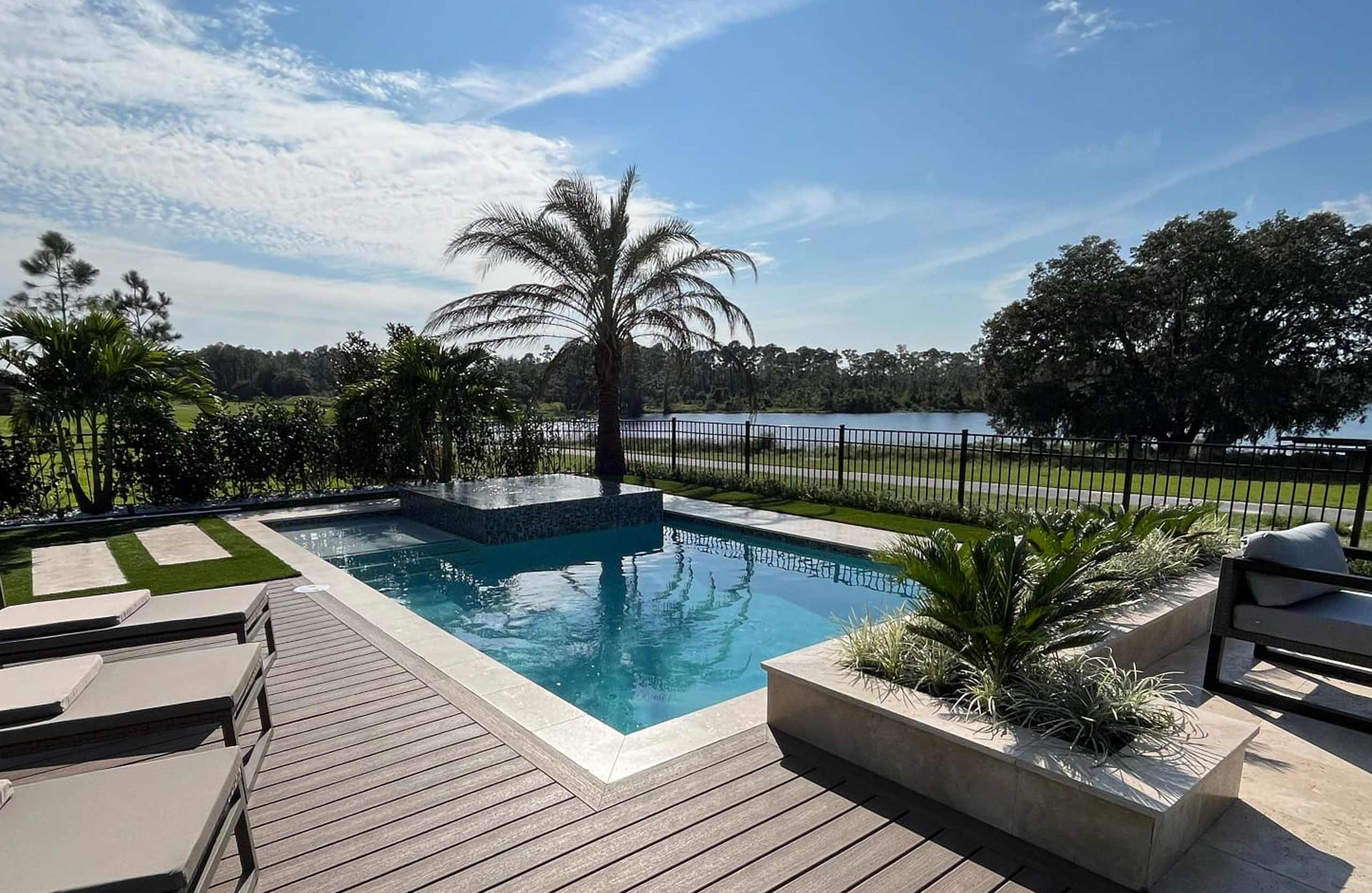 Luxury residential pool overlooking a lake in Central Florida