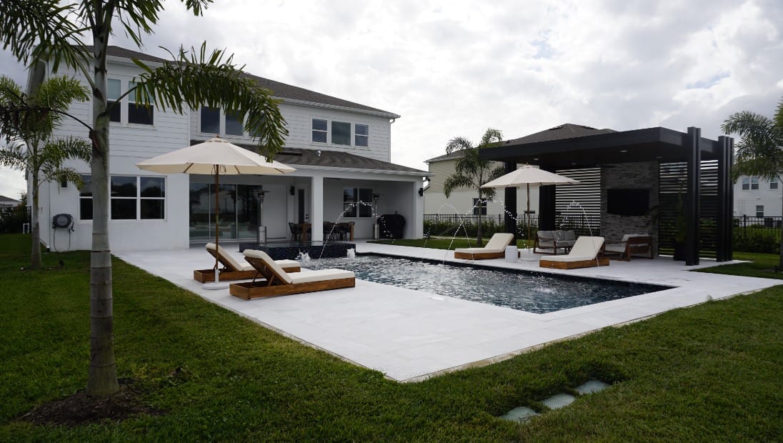 Modern Grunit pool and outdoor living space